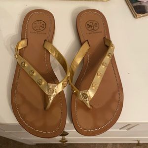 Tory Burch Gold Flip Flops